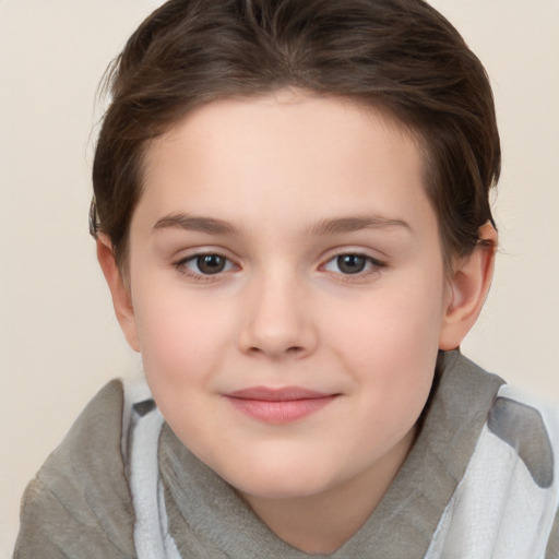 Joyful white child female with short  brown hair and brown eyes