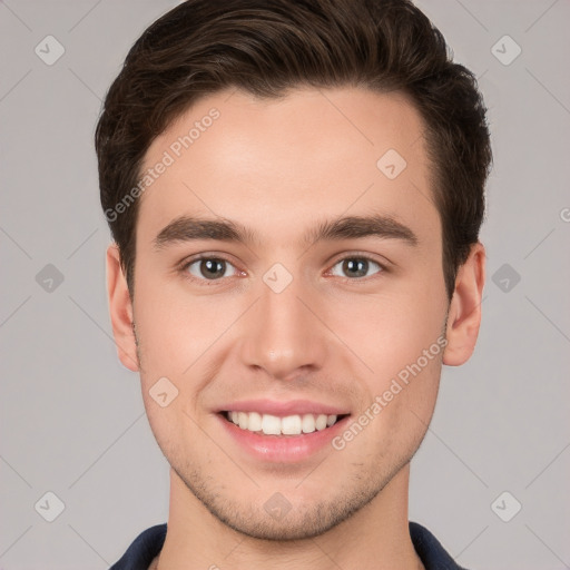 Joyful white young-adult male with short  brown hair and brown eyes