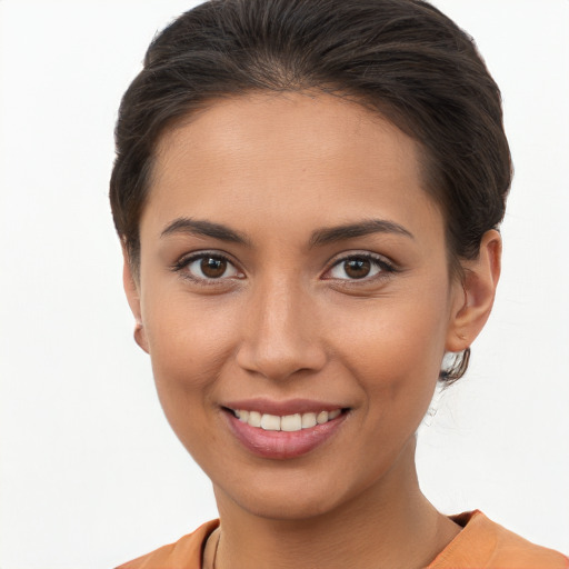 Joyful white young-adult female with short  brown hair and brown eyes