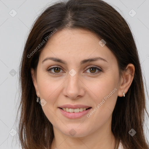 Joyful white young-adult female with long  brown hair and brown eyes