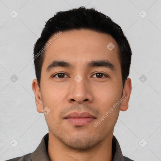 Neutral latino young-adult male with short  black hair and brown eyes