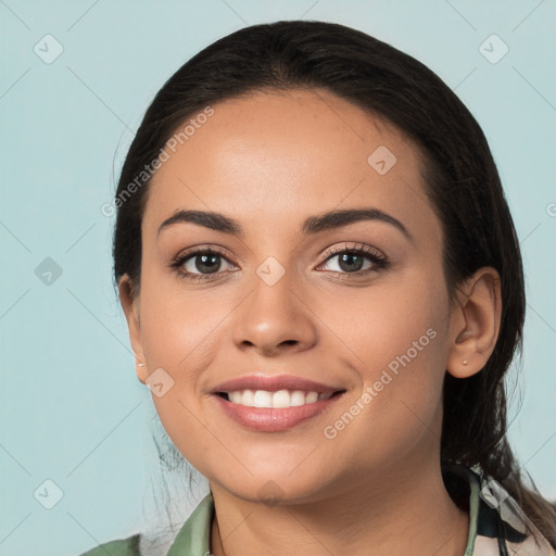 Joyful white young-adult female with long  black hair and brown eyes