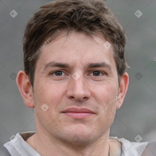 Joyful white adult male with short  brown hair and grey eyes