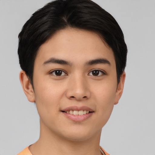 Joyful asian young-adult female with short  brown hair and brown eyes