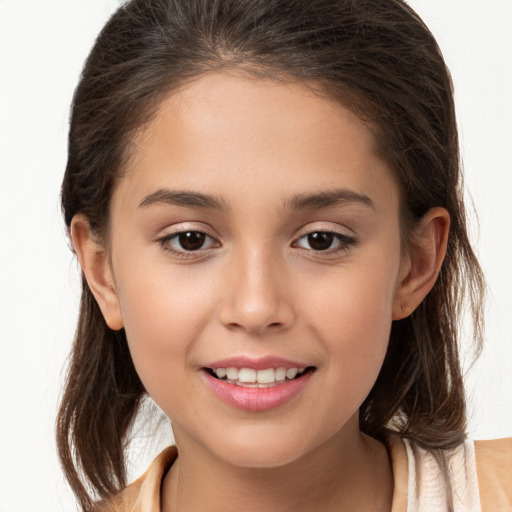 Joyful white child female with long  brown hair and brown eyes