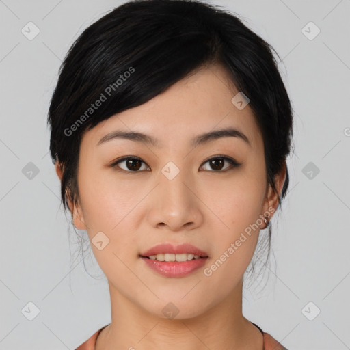 Joyful asian young-adult female with medium  black hair and brown eyes