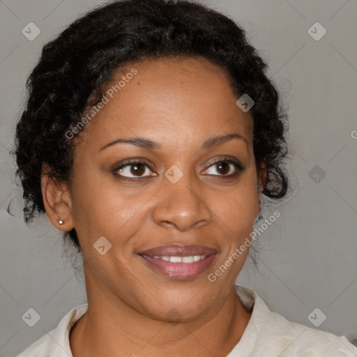 Joyful black adult female with short  brown hair and brown eyes