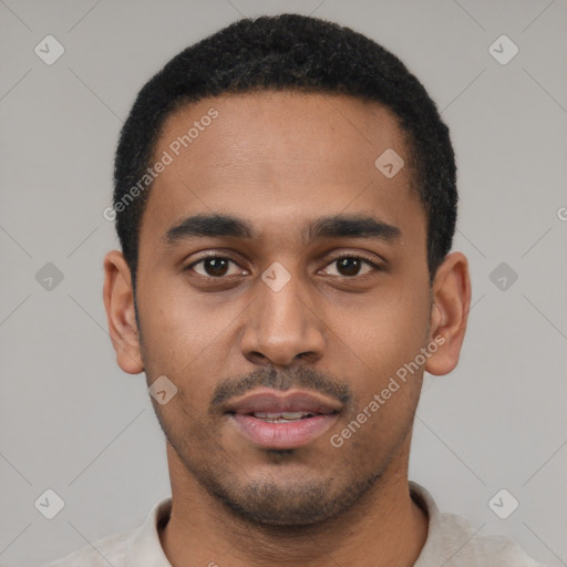 Neutral black young-adult male with short  black hair and brown eyes