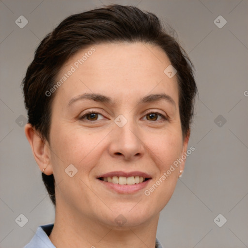 Joyful white adult female with short  brown hair and brown eyes