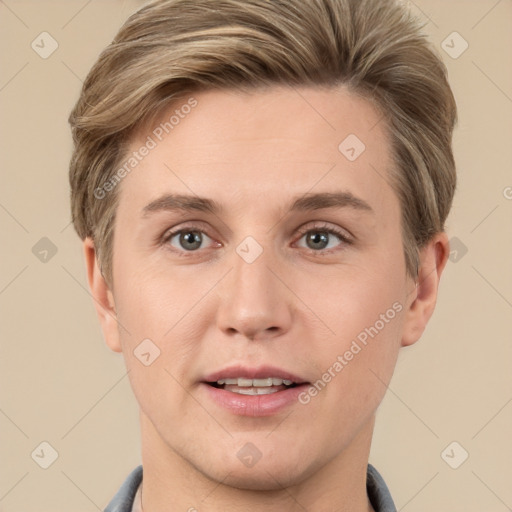 Joyful white adult male with short  brown hair and grey eyes