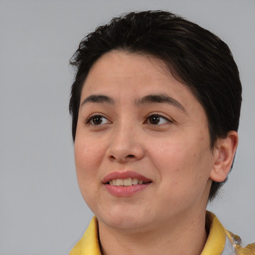 Joyful asian young-adult female with medium  brown hair and brown eyes