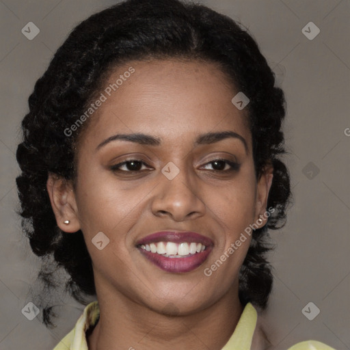 Joyful black young-adult female with medium  brown hair and brown eyes