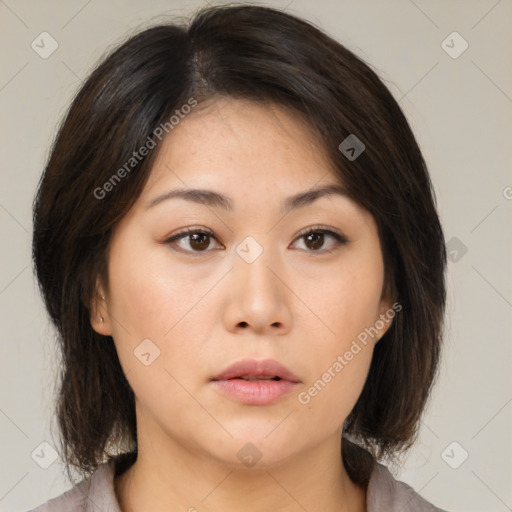 Neutral asian young-adult female with medium  brown hair and brown eyes