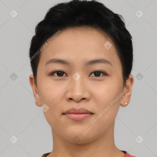 Joyful asian young-adult female with short  brown hair and brown eyes