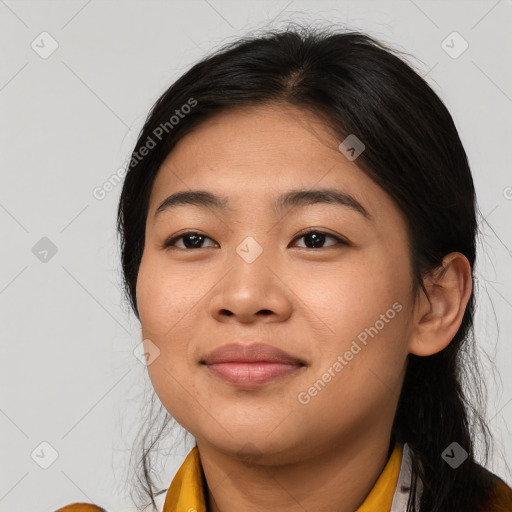 Joyful asian young-adult female with medium  black hair and brown eyes