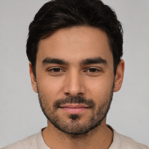 Neutral white young-adult male with short  black hair and brown eyes