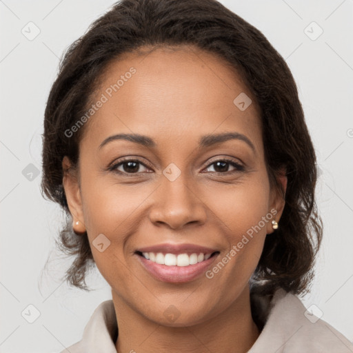 Joyful latino young-adult female with medium  brown hair and brown eyes