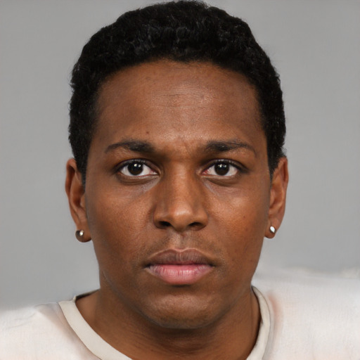 Neutral black young-adult male with short  black hair and brown eyes