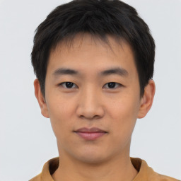 Neutral asian young-adult male with short  brown hair and brown eyes