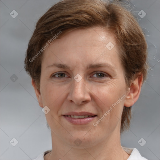 Joyful white adult female with short  brown hair and brown eyes