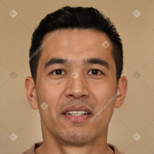 Joyful white young-adult male with short  black hair and brown eyes