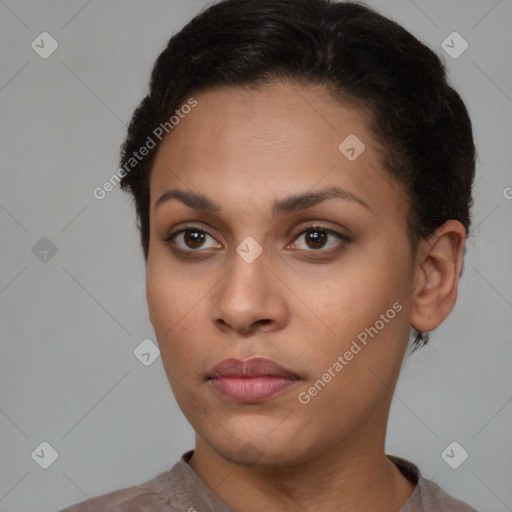 Neutral latino young-adult female with short  brown hair and brown eyes