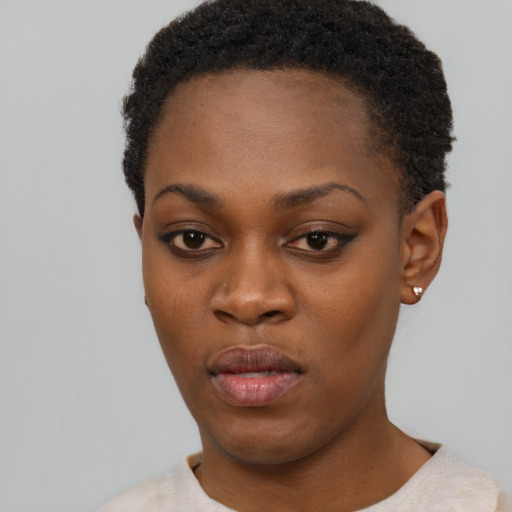 Neutral black young-adult female with short  black hair and brown eyes