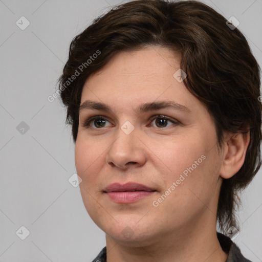 Joyful white young-adult female with medium  brown hair and brown eyes