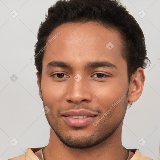 Joyful latino young-adult male with short  brown hair and brown eyes