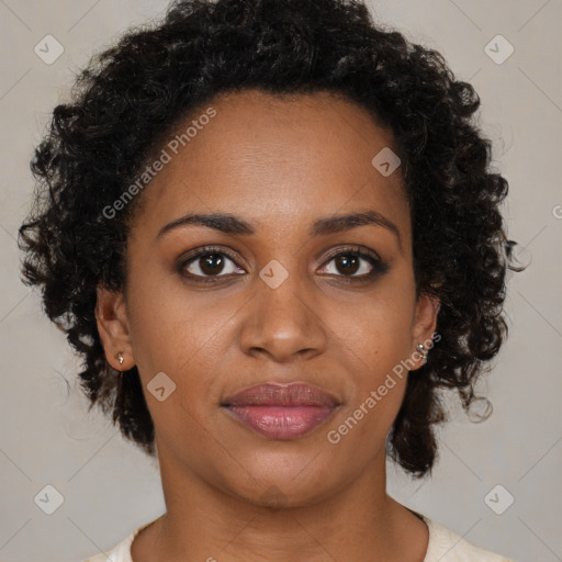 Joyful black young-adult female with medium  brown hair and brown eyes