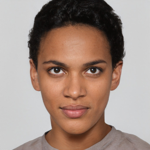 Neutral latino young-adult female with short  black hair and brown eyes