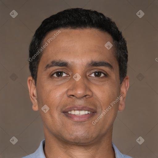 Joyful latino young-adult male with short  black hair and brown eyes