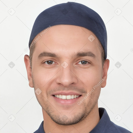 Joyful white young-adult male with short  brown hair and brown eyes