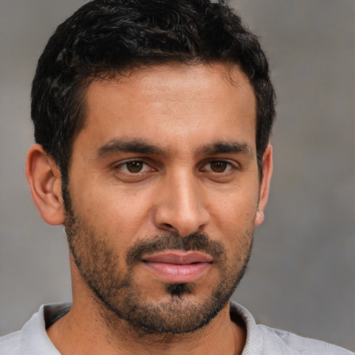 Neutral latino young-adult male with short  brown hair and brown eyes