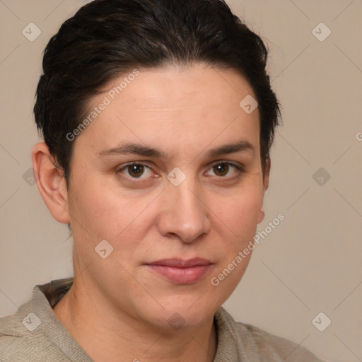 Joyful white adult female with short  brown hair and brown eyes