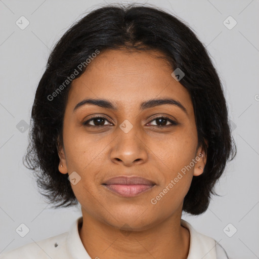 Joyful black young-adult female with medium  brown hair and brown eyes