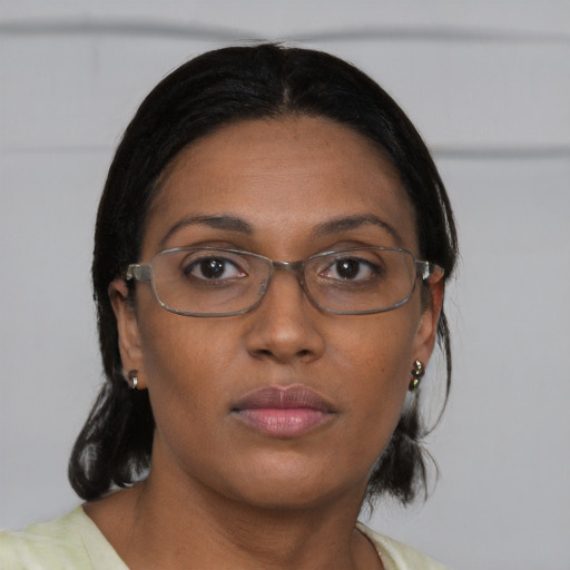 Neutral asian young-adult female with medium  brown hair and brown eyes