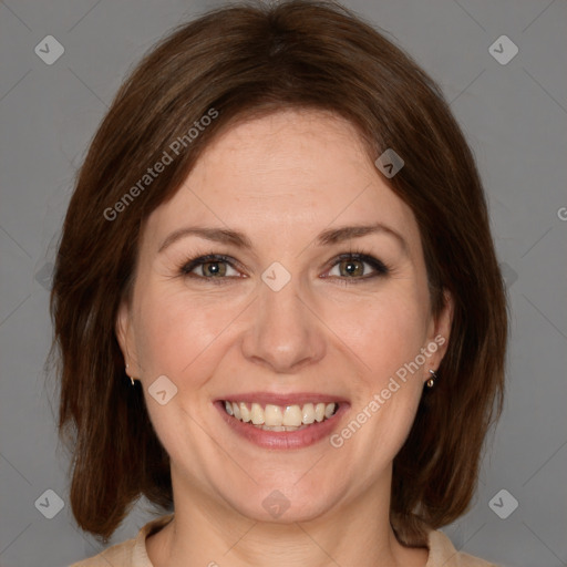 Joyful white adult female with medium  brown hair and grey eyes