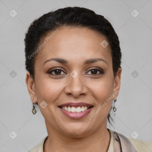 Joyful latino young-adult female with short  brown hair and brown eyes