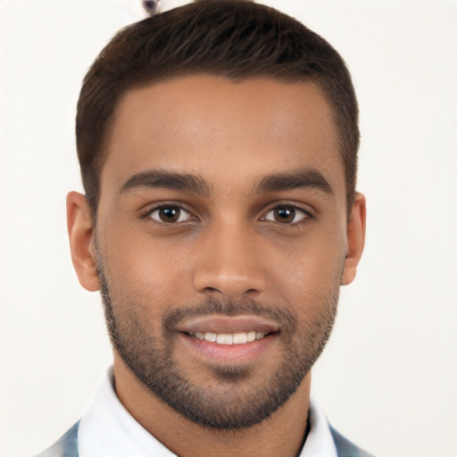 Joyful white young-adult male with short  brown hair and brown eyes