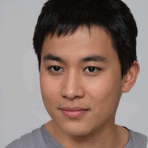 Neutral asian young-adult male with short  black hair and brown eyes