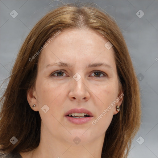 Joyful white adult female with medium  brown hair and brown eyes