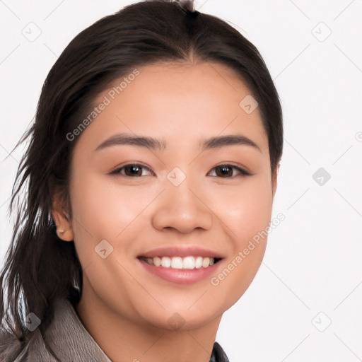 Joyful white young-adult female with long  black hair and brown eyes