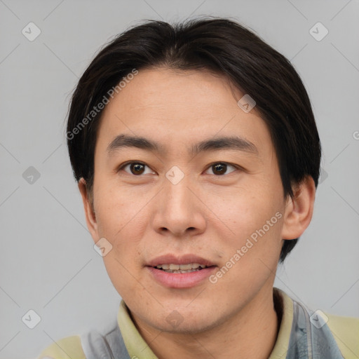 Joyful asian young-adult male with short  brown hair and brown eyes