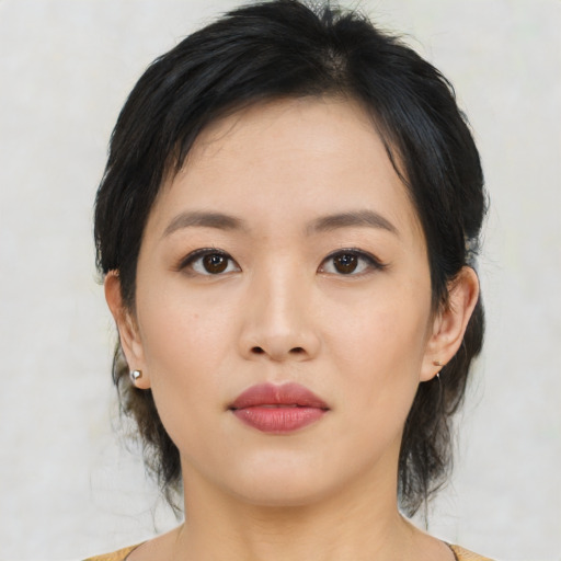 Neutral asian young-adult female with medium  black hair and brown eyes