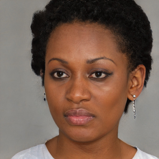 Neutral black young-adult female with short  brown hair and brown eyes