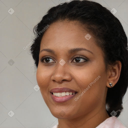 Joyful black young-adult female with medium  brown hair and brown eyes