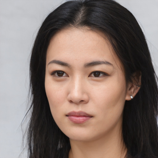 Neutral asian young-adult female with long  brown hair and brown eyes