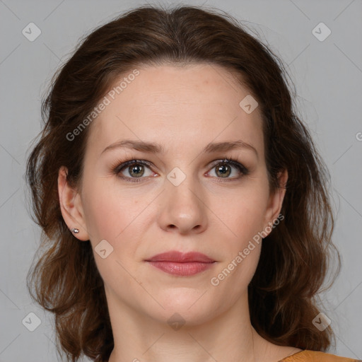 Joyful white young-adult female with medium  brown hair and green eyes