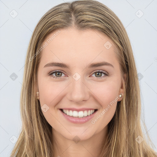 Joyful white young-adult female with long  brown hair and green eyes